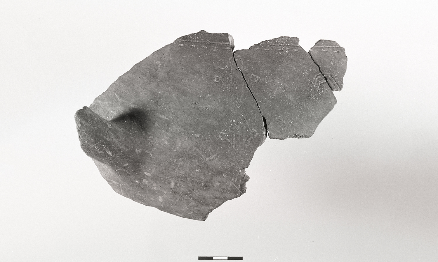 Part of clay vessel.